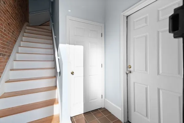 a view of an entryway with stairs