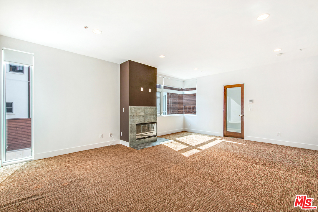717 South Broadway, Unit B Redondo Beach, CA 90277 - Photo 12 of 29 a view of an empty room with a window