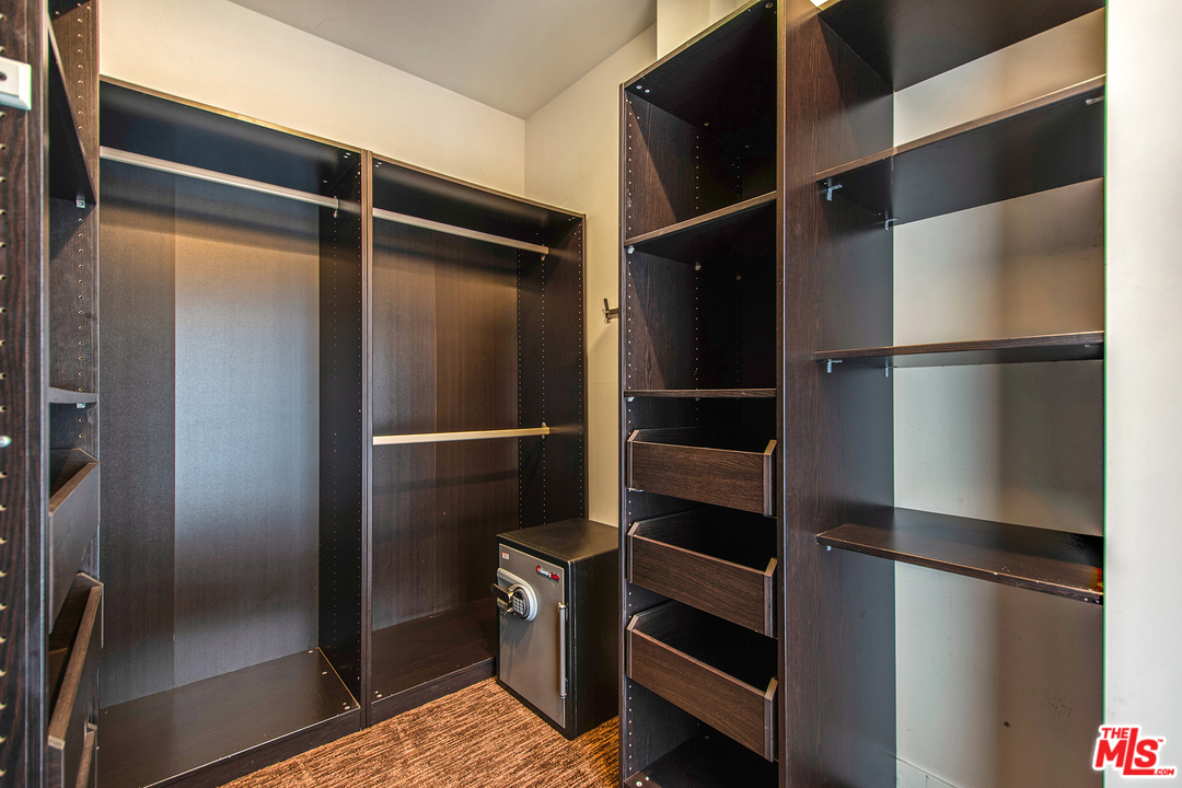 717 South Broadway, Unit B Redondo Beach, CA 90277 - Photo 14 of 29 a view of walk in closet with empty racks