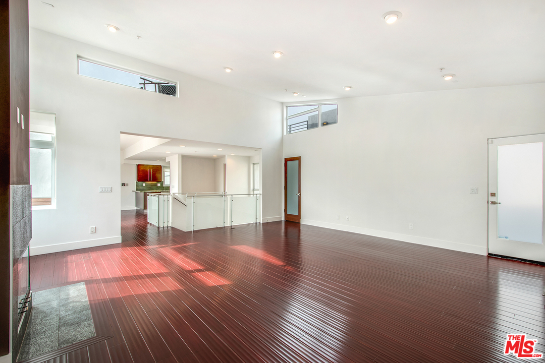 717 South Broadway, Unit B Redondo Beach, CA 90277 - Photo 19 of 29 a view of a livingroom with wooden floor