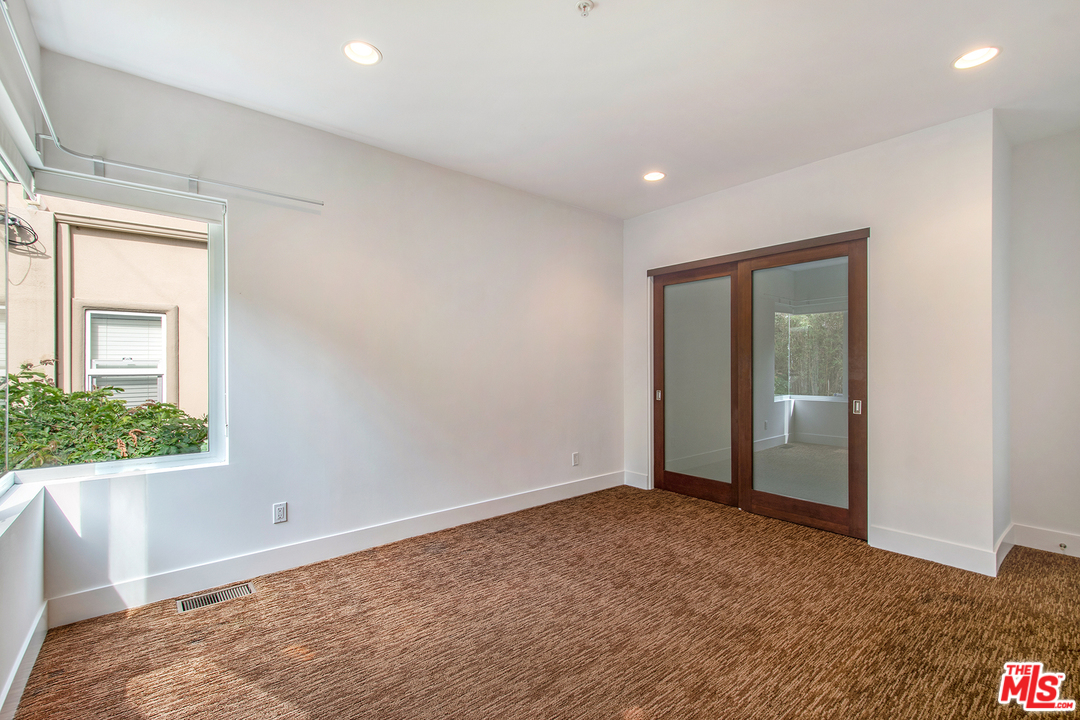 717 South Broadway, Unit B Redondo Beach, CA 90277 - Photo 9 of 29 a view of an empty room with a window