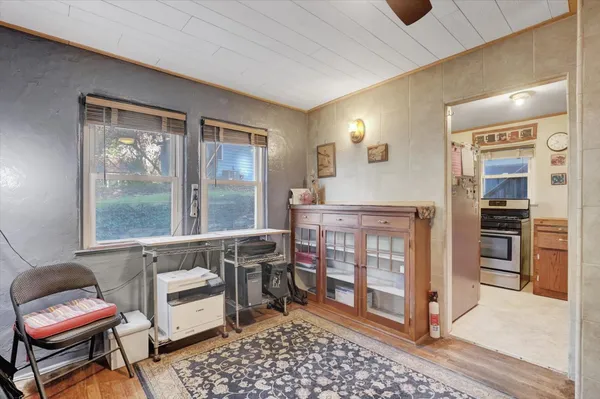 a kitchen with stainless steel appliances granite countertop a stove and a sink