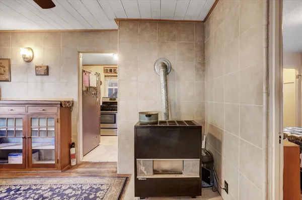 a kitchen with a stove a refrigerator and a stove