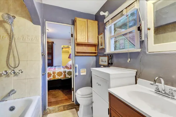 a view of storage and utility room with washer and dryer