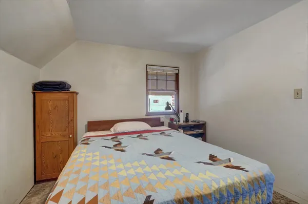 an aerial view of houses with outdoor space