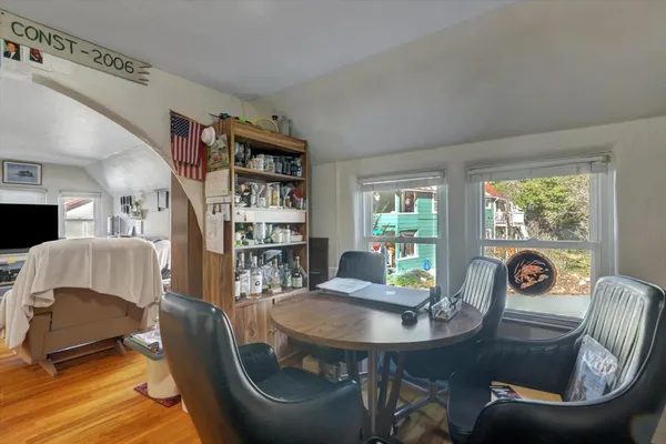 a view of a city with lush green forest