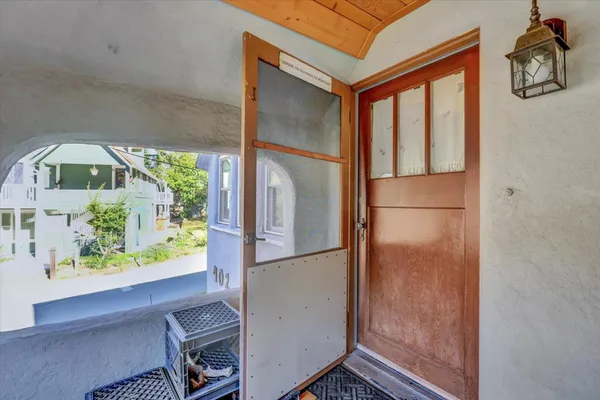 a view of multiple houses with a yard