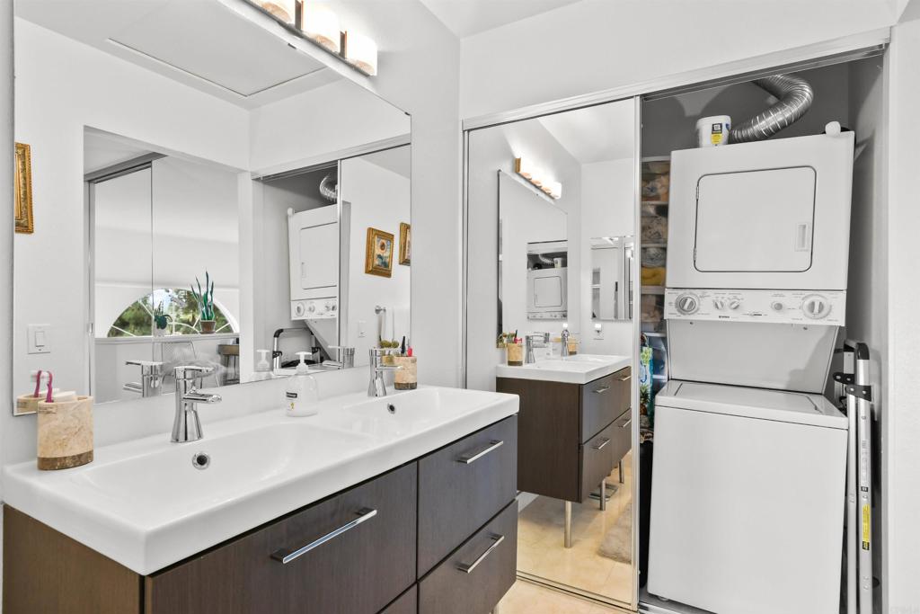 760 Eastshore Terrace, Unit 139 Chula Vista, CA 91913 - Photo 19 of 34 a bathroom with a double vanity sink mirror and