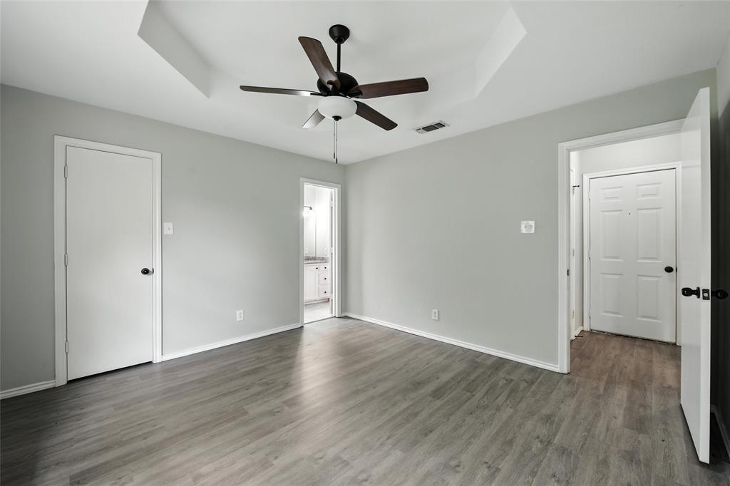 602 Valleyridge Court Decatur, TX 76234 - Photo 20 of 27 a view of an empty room with wooden floor