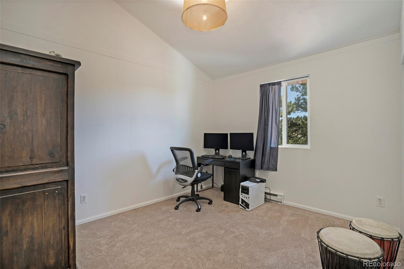 249 Burland Drive Bailey, CO 80421 - Photo 11 of 24 a view of a workspace with a window