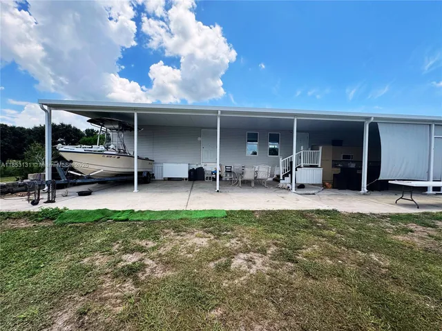 a room with stairs and furniture