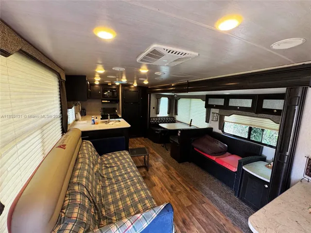 a kitchen with furniture and a stove