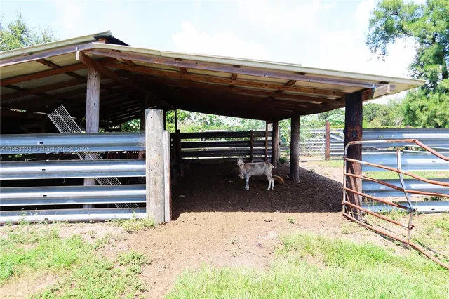 a view of swimming pool with a yard