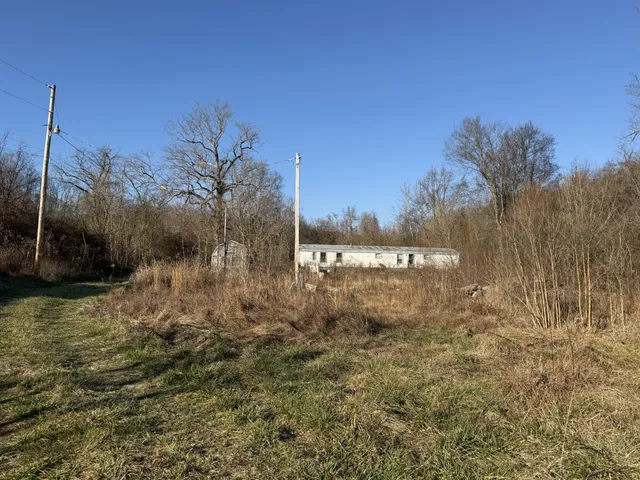 a view of a lake with a yard