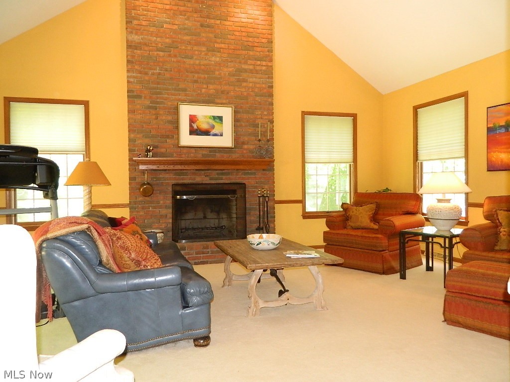 7580 Maple Grove Road Chesterland, OH 44026 - Photo 13 of 35 Gorgeous Vaulted Family Room with Raised Hearth, Floor to Ceiling Masonry Wood Burning Fireplace with Gas Starter, Custom Blinds for All Windows ...