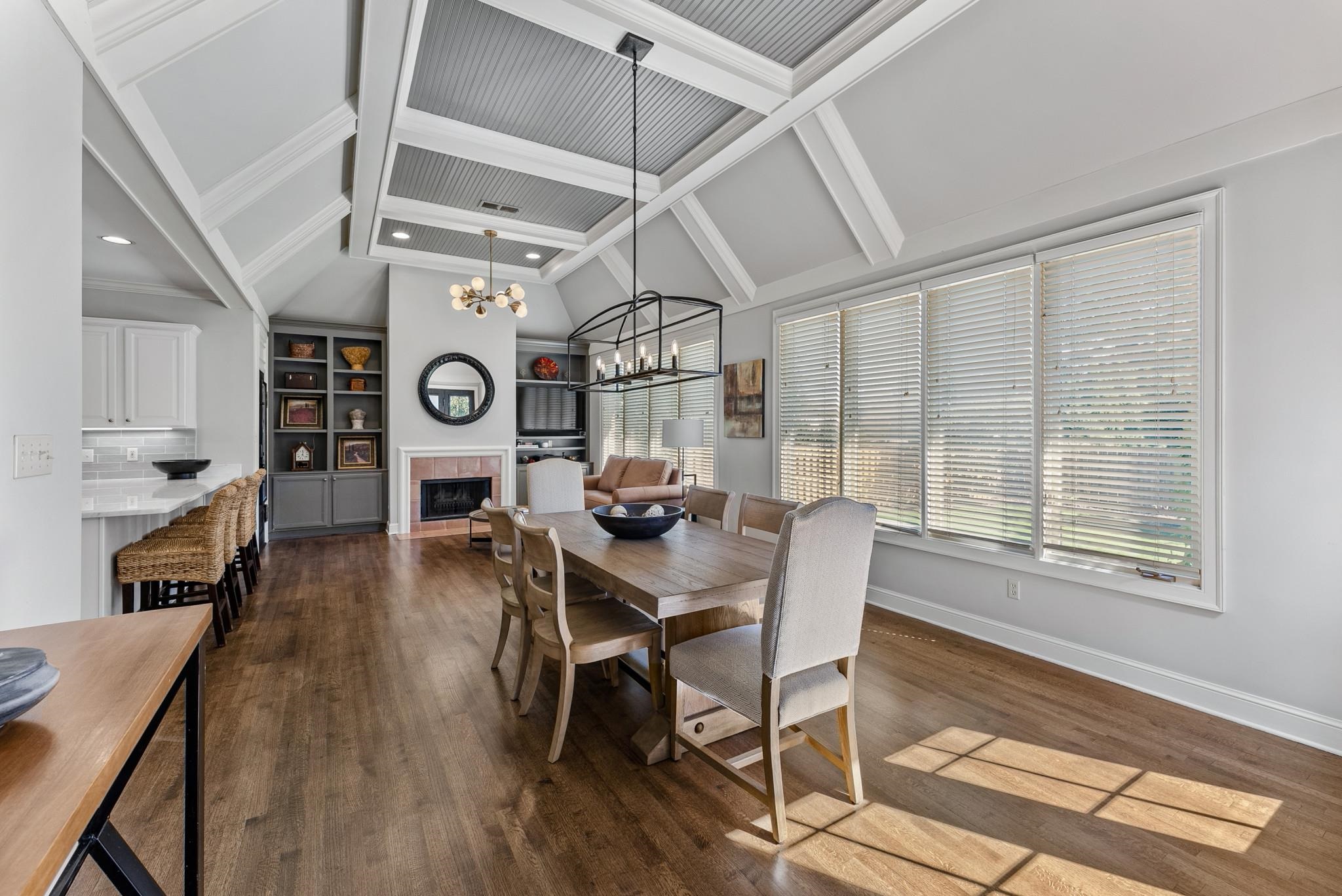 2161 Gallina Circle Collierville, TN 38017 - Photo 13 of 25 a view of a dining room with furniture window and wooden floor