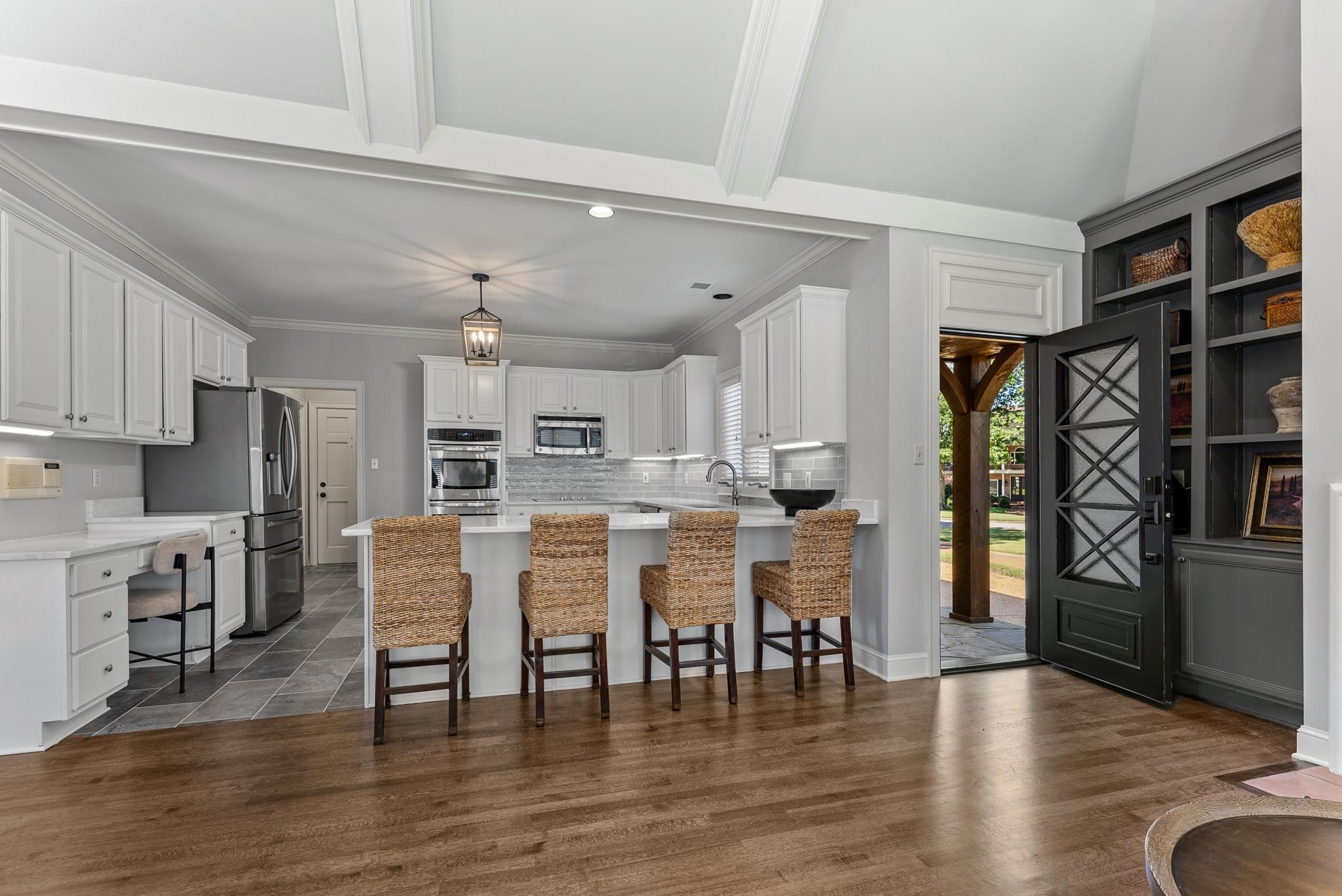 2161 Gallina Circle Collierville, TN 38017 - Photo 14 of 25 a view of kitchen with refrigerator and wooden floor