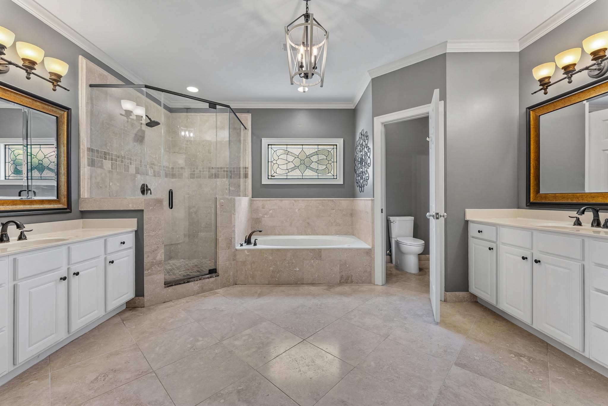 2161 Gallina Circle Collierville, TN 38017 - Photo 19 of 25 a spacious bathroom with a tub sink shower and mirror