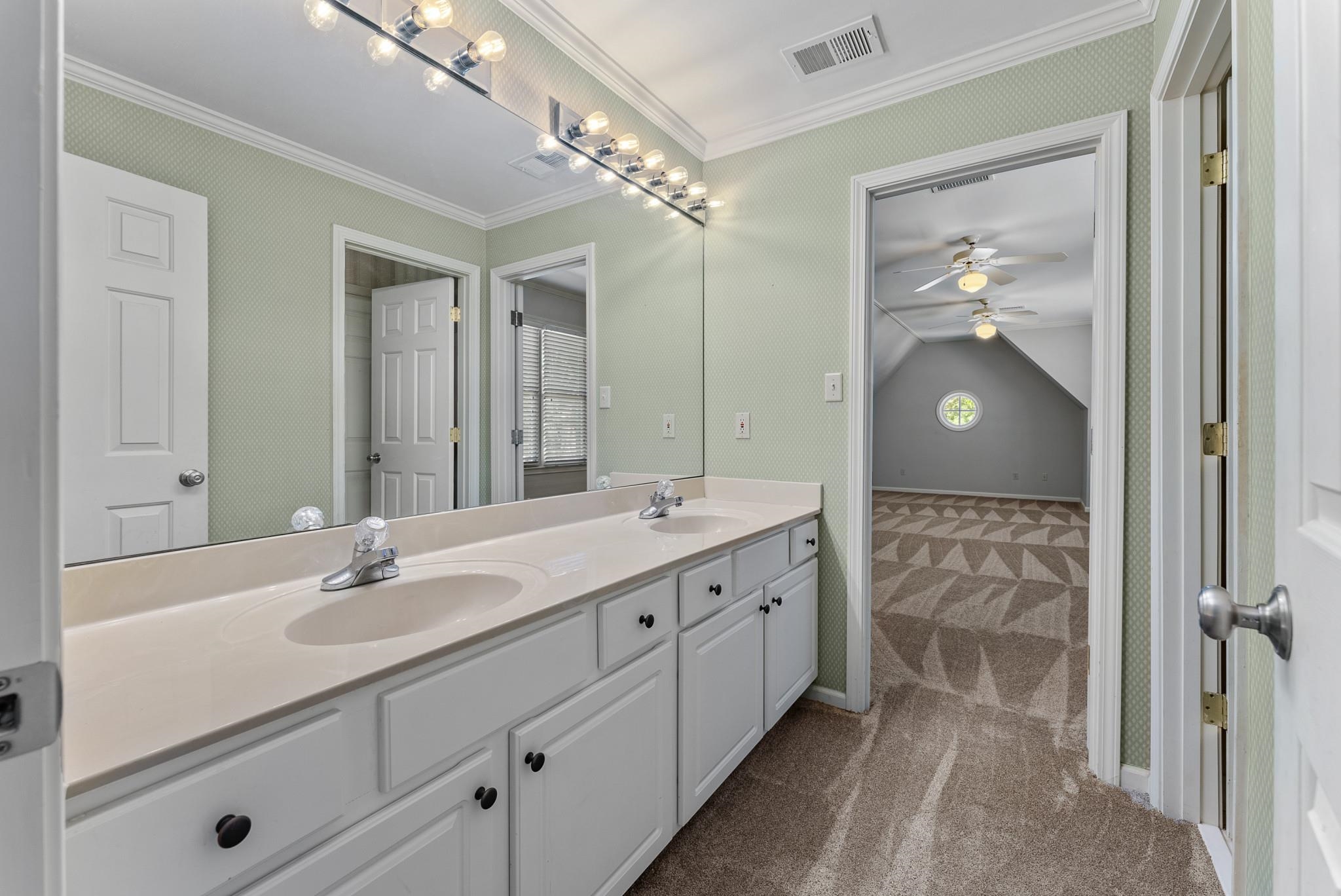 2161 Gallina Circle Collierville, TN 38017 - Photo 20 of 25 a bathroom with a double vanity sink and a mirror