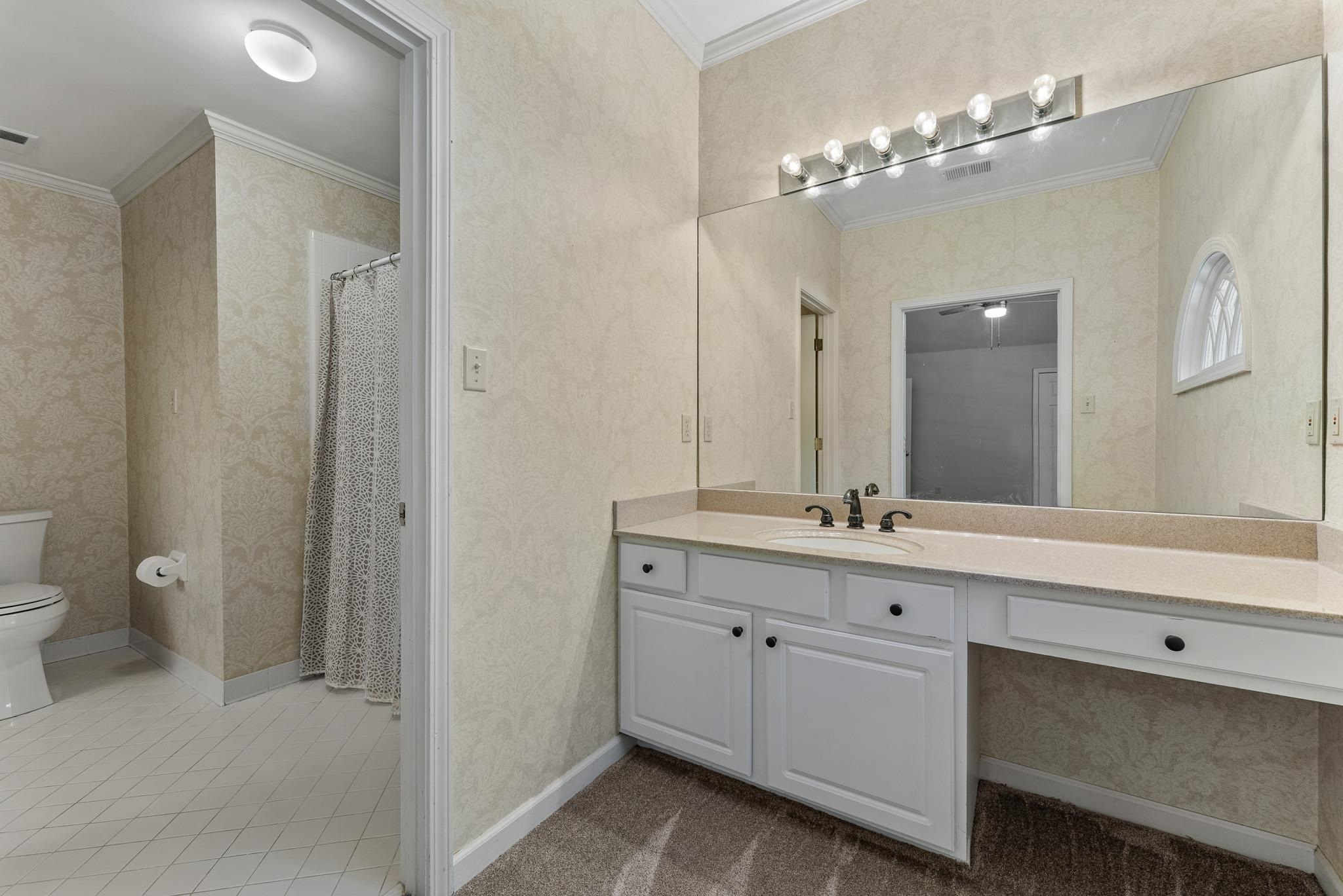 2161 Gallina Circle Collierville, TN 38017 - Photo 23 of 25 a bathroom with a double vanity sink and a mirror