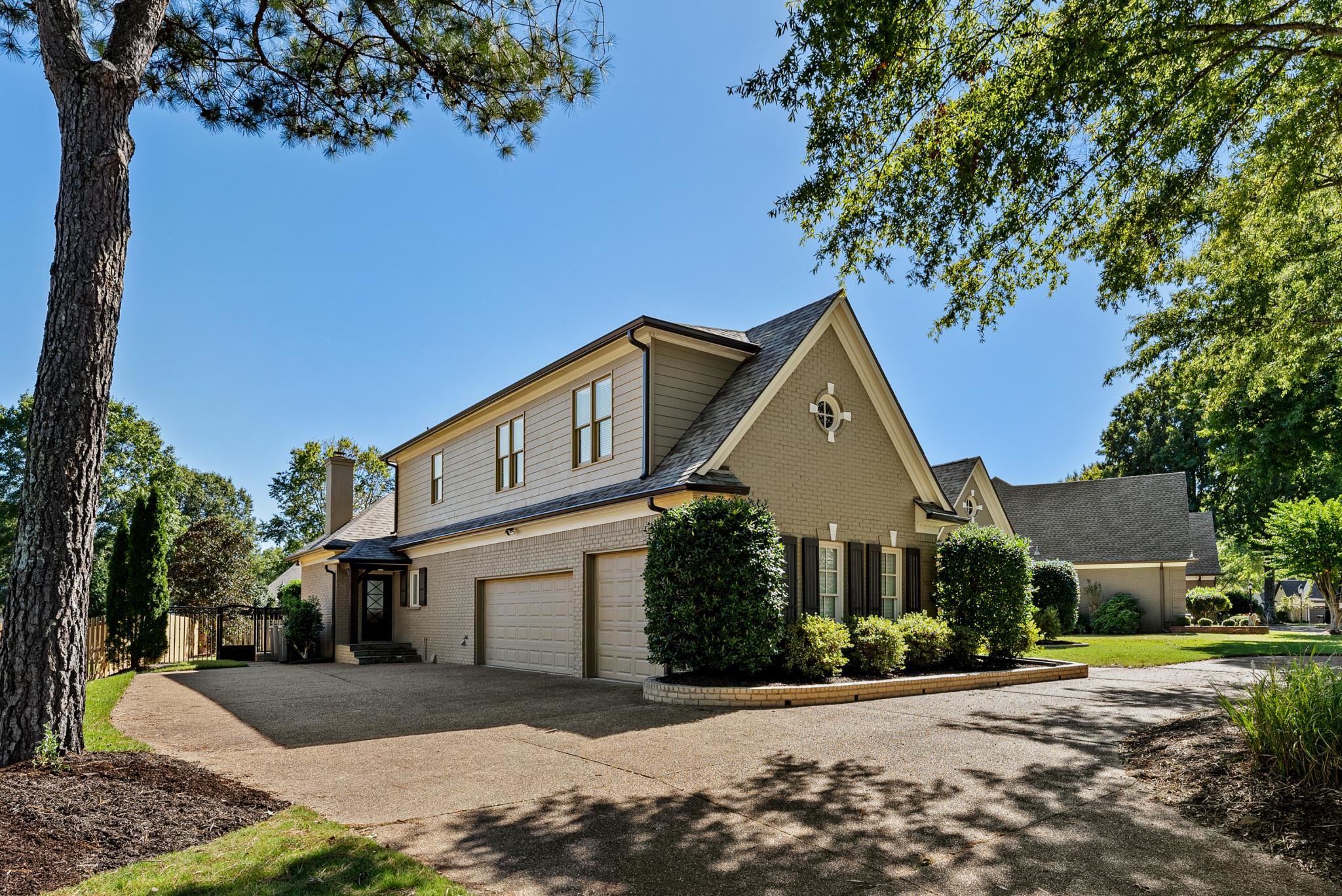 2161 Gallina Circle Collierville, TN 38017 - Photo 3 of 25 a front view of a house with a garden