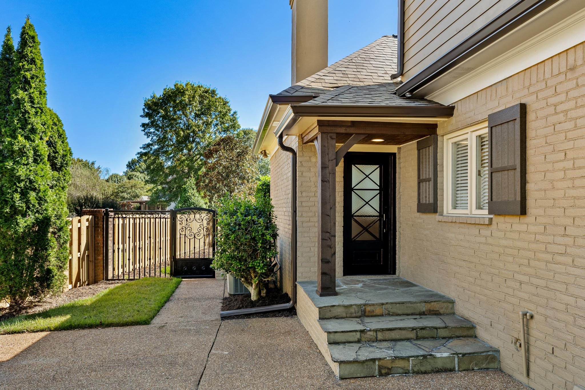 2161 Gallina Circle Collierville, TN 38017 - Photo 4 of 25 a front view of a house with a garden
