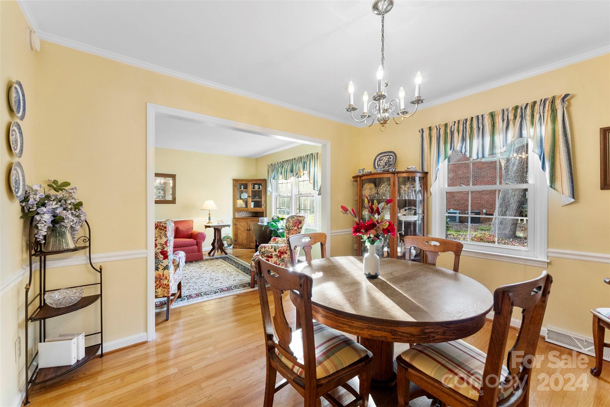 4356 Old Forge Drive Gastonia, NC 28056 - Photo 20 of 39 a view of a dining room with furniture window and wooden floor