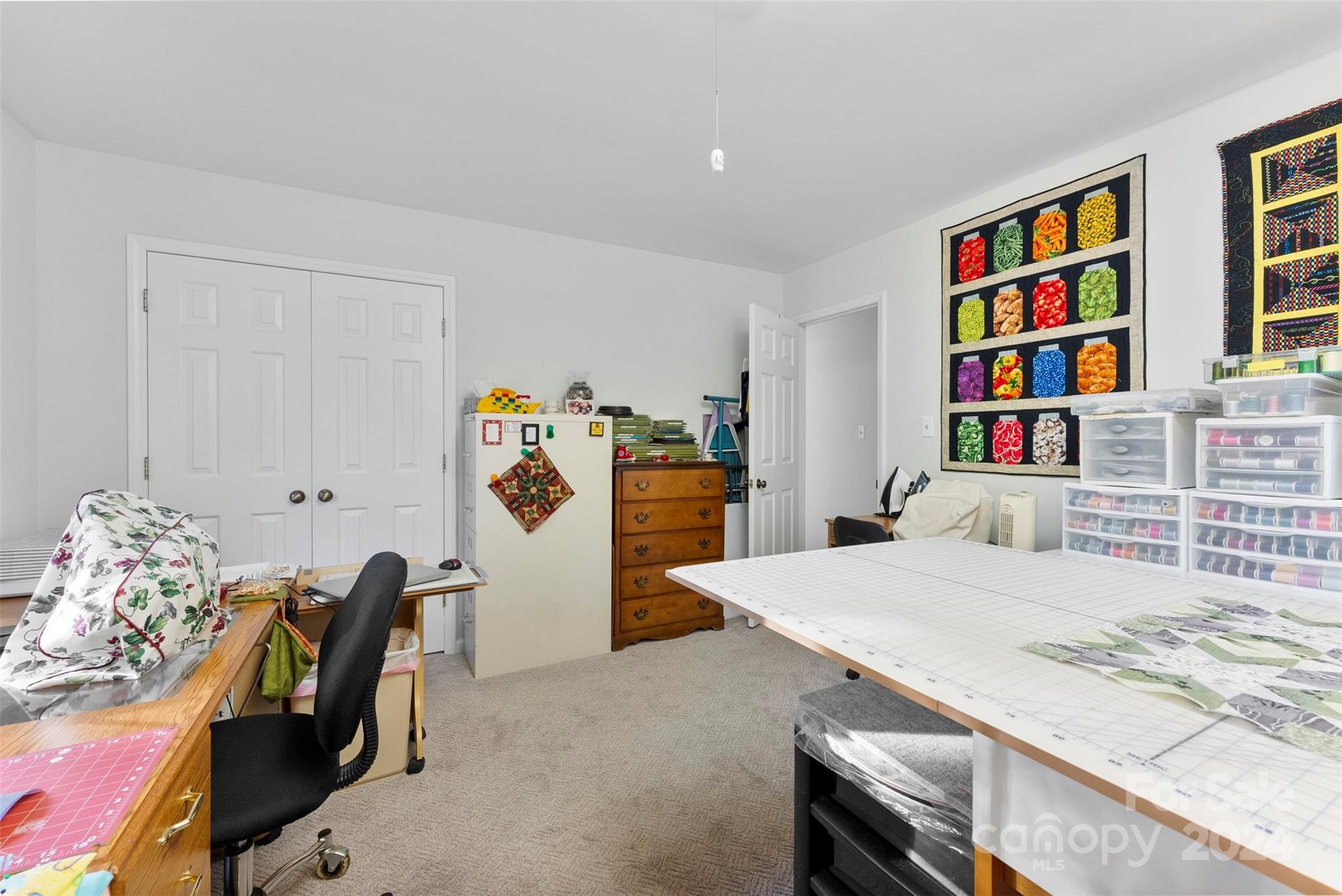 4356 Old Forge Drive Gastonia, NC 28056 - Photo 29 of 39 a bedroom with a bed and a bookshelf
