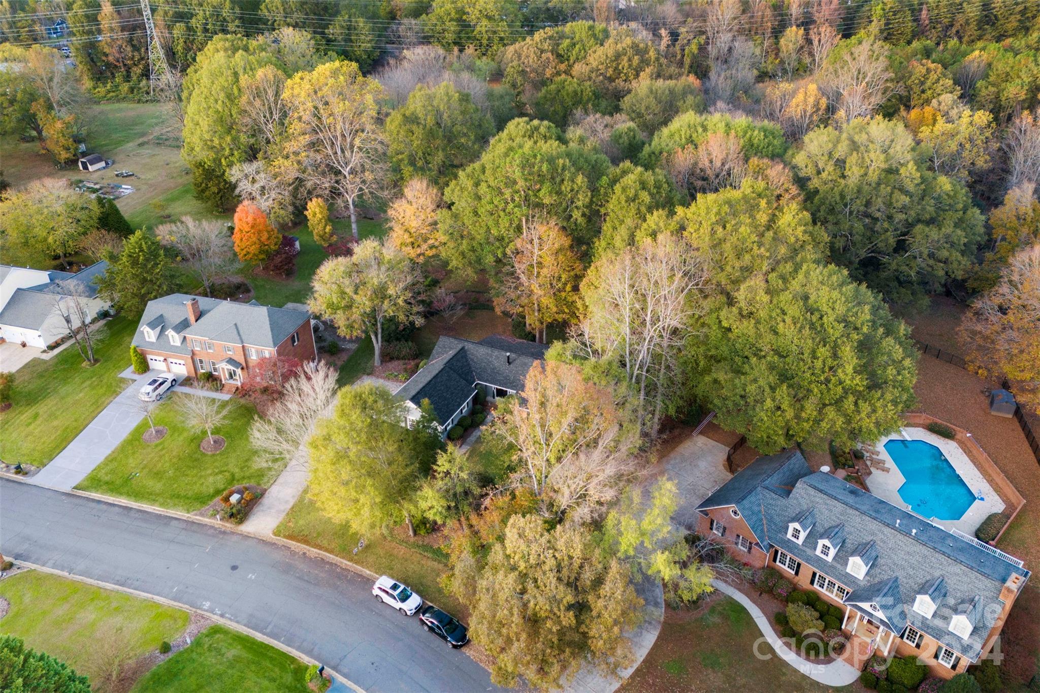4356 Old Forge Drive Gastonia, NC 28056 - Photo 38 of 39 an aerial view of a house with a yard swimming pool and outdoor seating