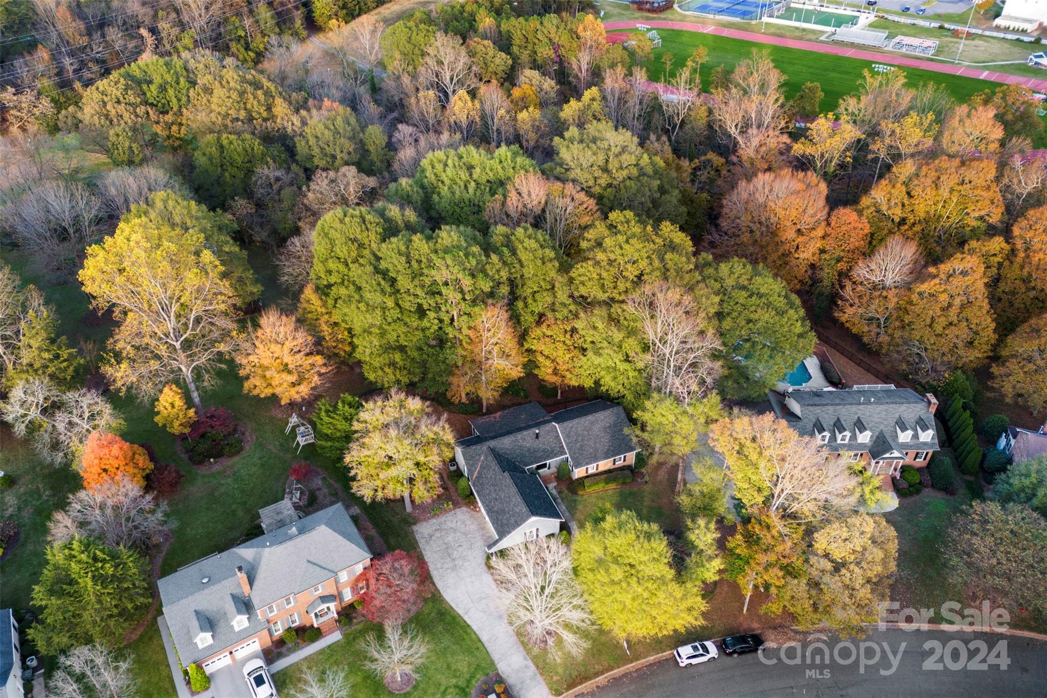 4356 Old Forge Drive Gastonia, NC 28056 - Photo 39 of 39 an aerial view of a house with a yard and garden
