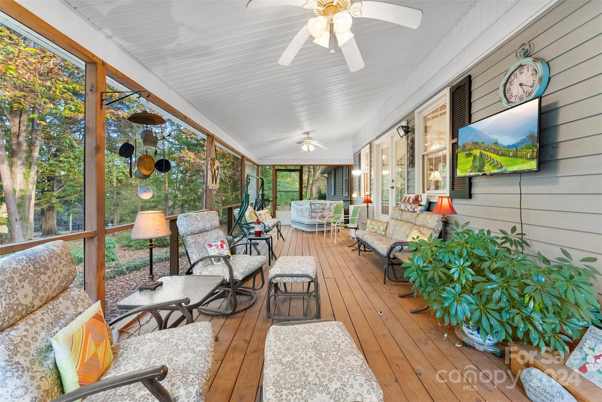 4356 Old Forge Drive Gastonia, NC 28056 - Photo 4 of 39 a view of a dining room with furniture a chandelier and large windows