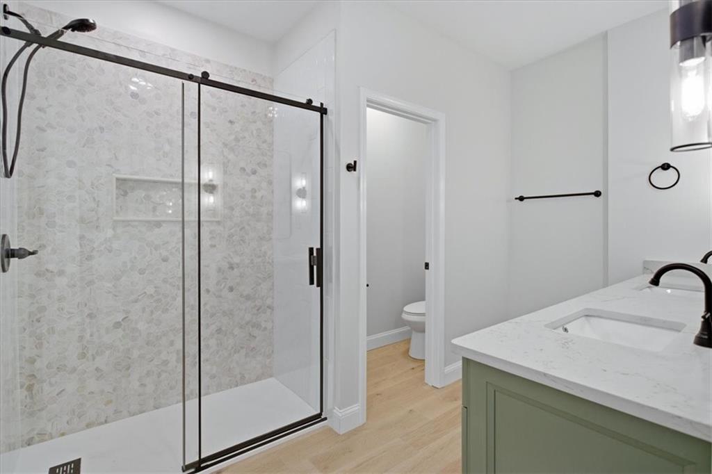 4911 Lower Jersey Road Oxford, GA 30054 - Photo 20 of 56 a bathroom with a shower and sink