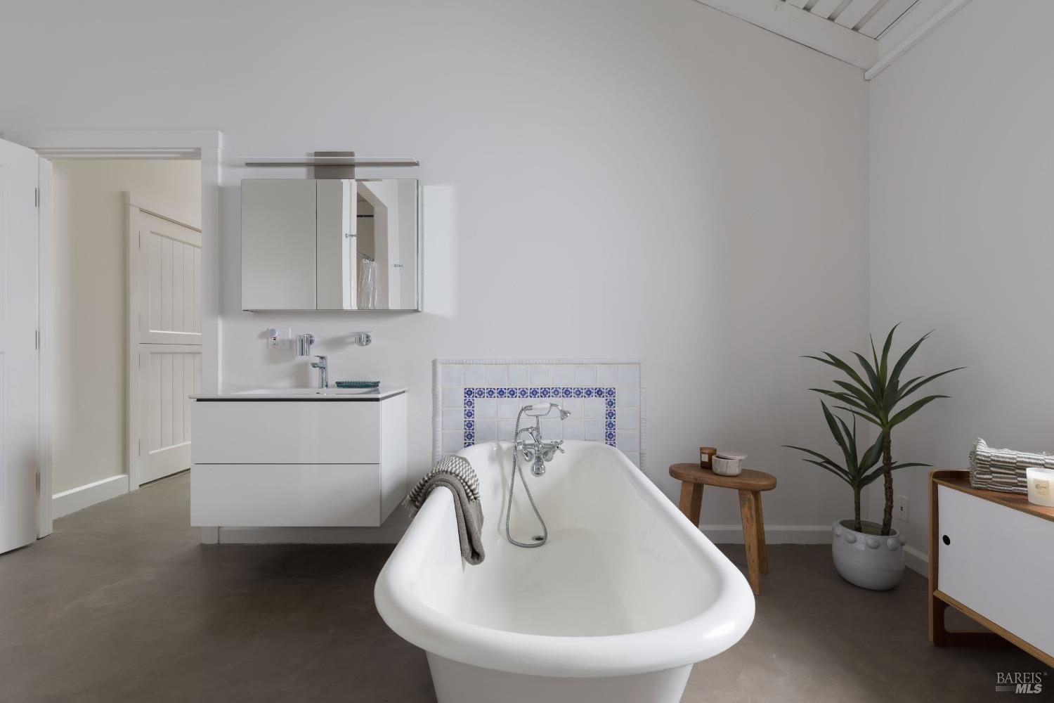 18800 Fitzpatrick Lane Occidental, CA 95465 - Photo 19 of 35 a bathroom with a toilet sink and mirror