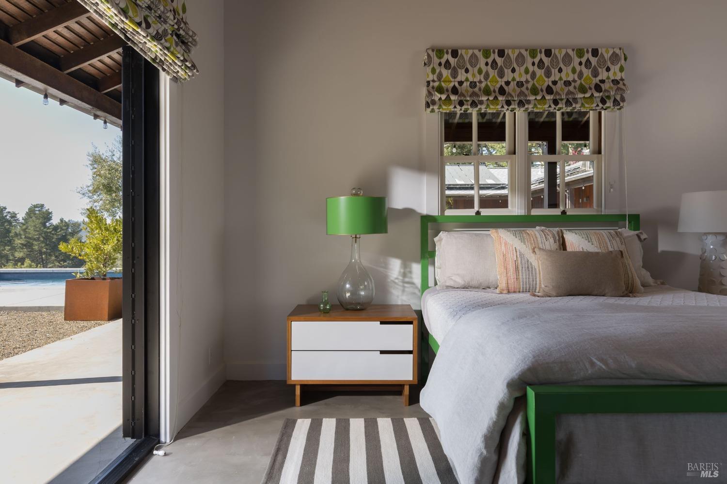 18800 Fitzpatrick Lane Occidental, CA 95465 - Photo 22 of 35 a bedroom with a bed and a window