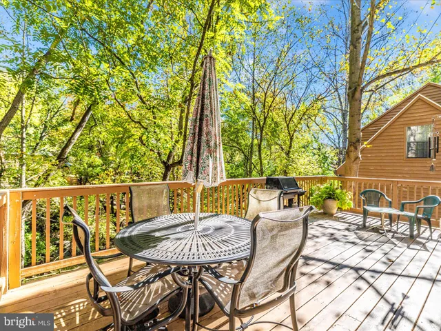 a kitchen with a stove microwave and cabinets