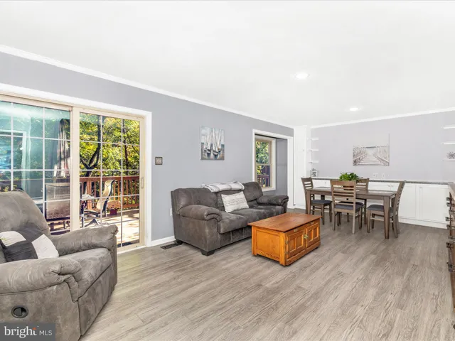 a bathroom with a sink a toilet and shower curtain