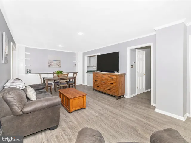 a bedroom with a bed and a mirror