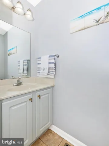 a bedroom with a bed and a table