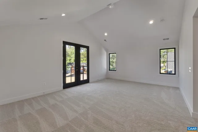 an empty room with windows