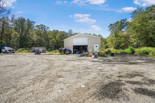 a room with lots of furniture and clutter