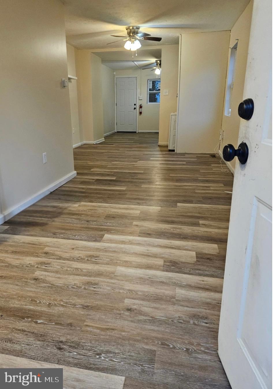 229 Sinnickson Street Salem, NJ 08079 - Photo 2 of 12 a view of a livingroom with wooden floor