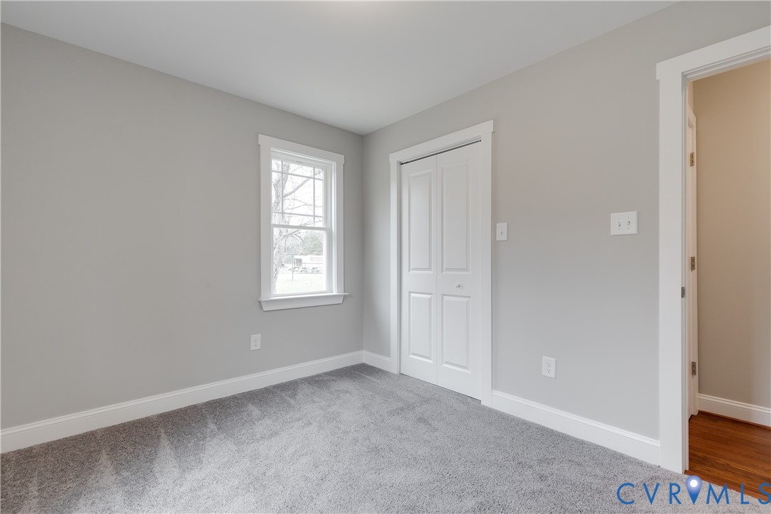 2545 Wickham Road Bumpass, VA 23024 - Photo 12 of 23 a view of an empty room with a window