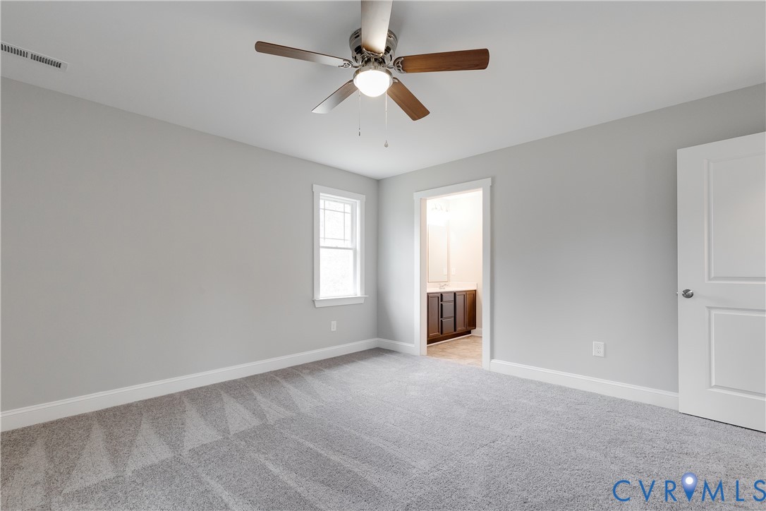 2545 Wickham Road Bumpass, VA 23024 - Photo 15 of 23 a view of an empty room with a window