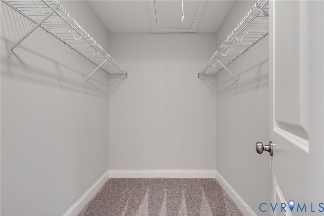 2545 Wickham Road Bumpass, VA 23024 - Photo 19 of 23 a view of a room with racks on the wall
