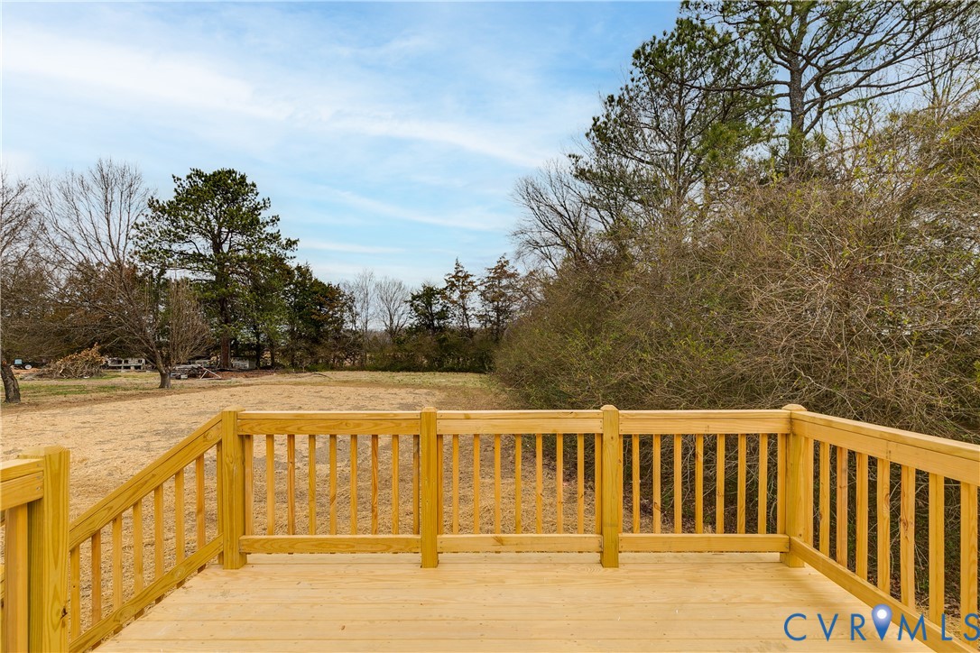 2545 Wickham Road Bumpass, VA 23024 - Photo 23 of 23 a view of swimming pool with outdoor space and seating area