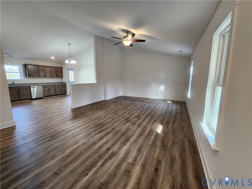 2545 Wickham Road Bumpass, VA 23024 - Photo 3 of 23 a view of a kitchen with cabinets and wooden floor