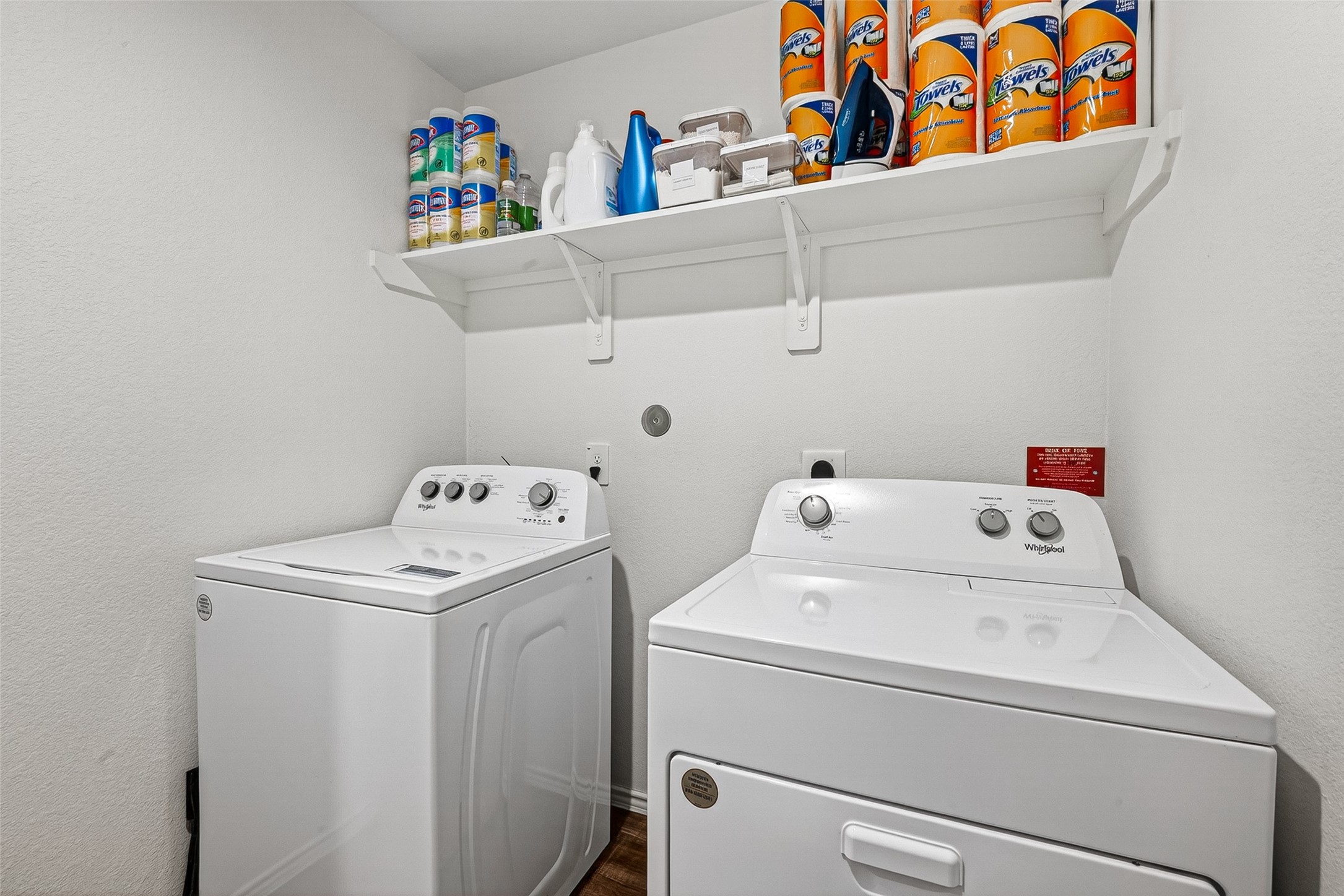 24318 Pebble Crescent Ln Spring Spring, TX 77373 - Photo 18 of 30 Functional and spacious laundry room offering added convenience with ample storage space and room for everyday organization and efficiency.