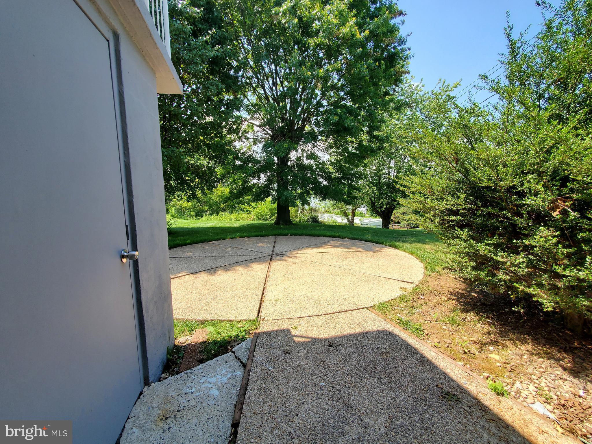 1512 Customs Road Baltimore, MD 21237 - Photo 35 of 43 a view of a backyard with a small cabin