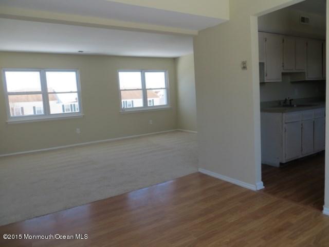 216 Sawmill Road Brick, NJ 08724 - Photo 4 of 11 wooden floor in an empty room with a window