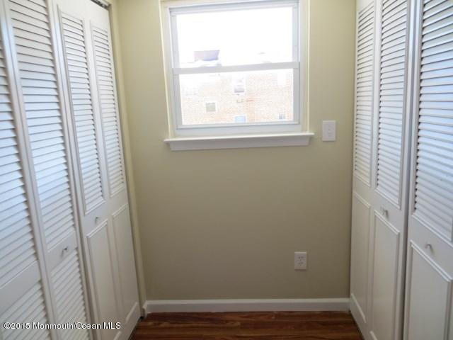 216 Sawmill Road Brick, NJ 08724 - Photo 8 of 11 a view of small space with wooden floor and a window